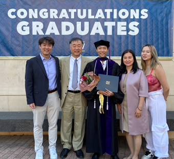 A group of people posing for a photoAI-generated content may be incorrect.